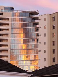 Low angle view of buildings against sky