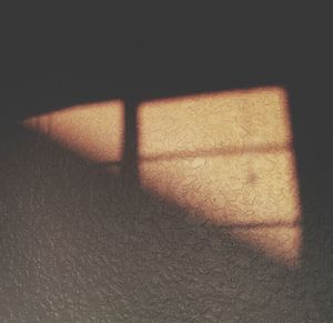 Close-up of shadow on floor