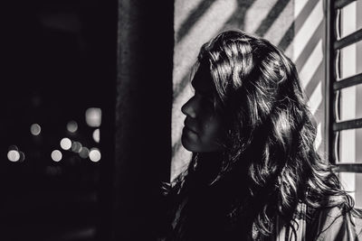 Close-up side view of young woman