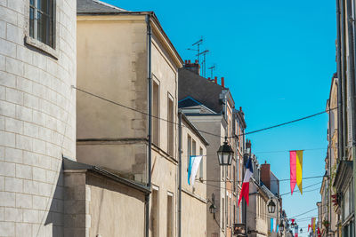 Low angle view of buildings against clear sky