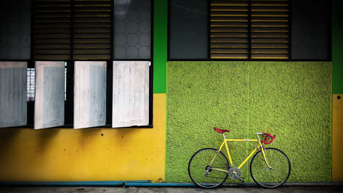 Close-up of parked against wall