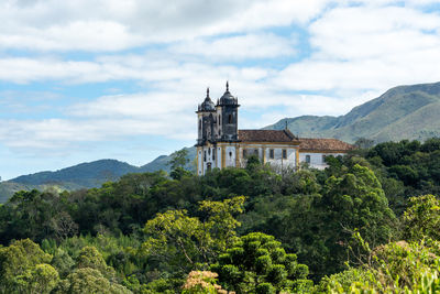 View of historic building against cloudy sky