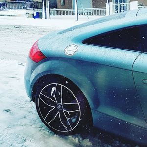 Bicycle wheel in snow