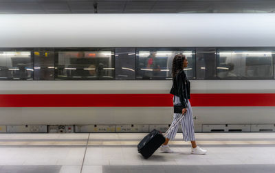 Blurred motion of train at railroad station