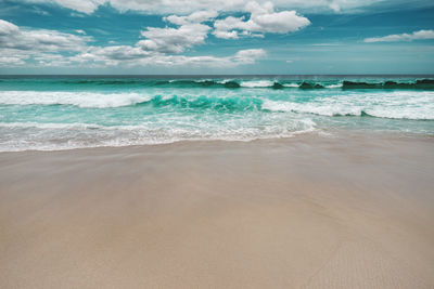 Scenic view of beach against sky