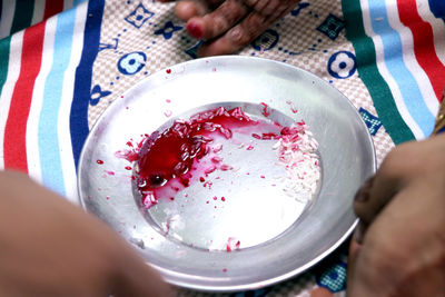 Midsection of person holding ice cream