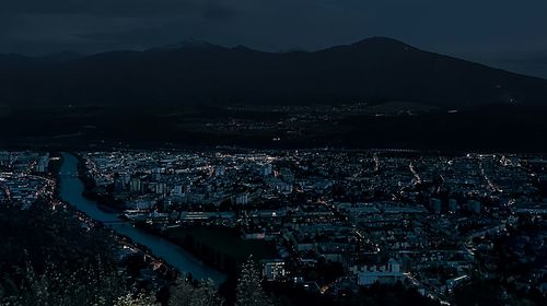 Aerial view of illuminated cityscape