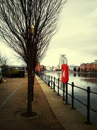 Empty footbridge over river