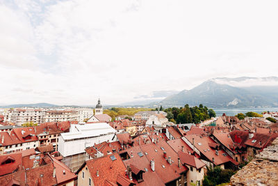 Annecy city top view, lake in the distance. tile roofs, cathedral. high quality photo