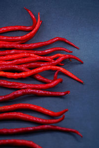 High angle view of red chili peppers on table