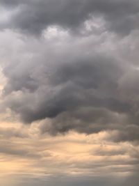 Low angle view of cloudy sky during sunset