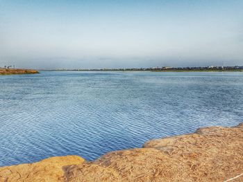 Scenic view of calm sea against sky