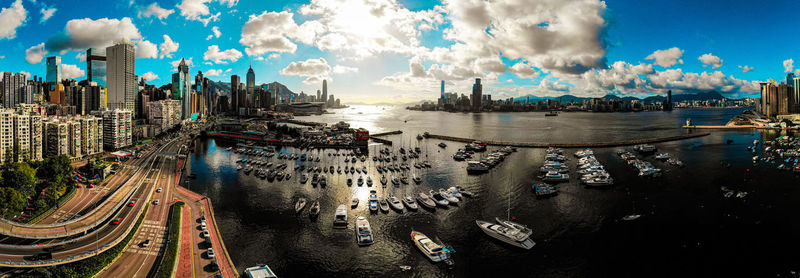 Panoramic view of city buildings against sky