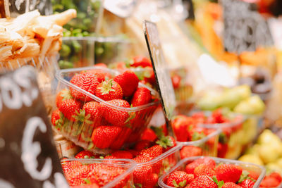 Close-up of chopped fruits for sale at market stall