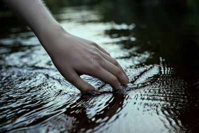 Low section of child on water