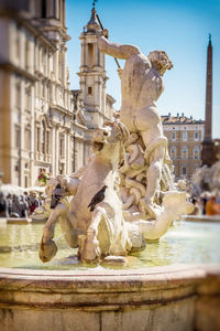 Statue of fountain in city