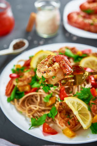 Stir fry noodle with shrimps, asian cuisine, cooked soba