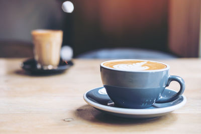 Close-up of coffee cup on table