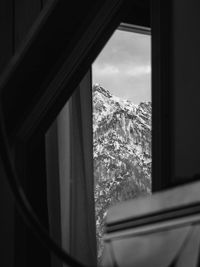 Close-up of glass window of building