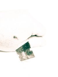 High angle view of cigarette against white background