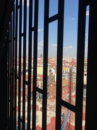 Buildings seen through glass window