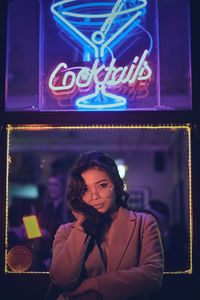 Portrait of young woman in nightclub