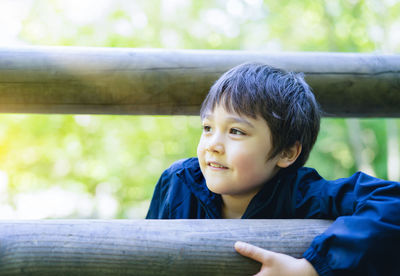 Portrait of cute boy looking away