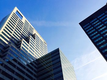 Low angle view of skyscrapers against sky