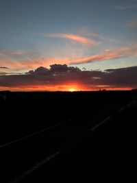 Scenic view of dramatic sky during sunset