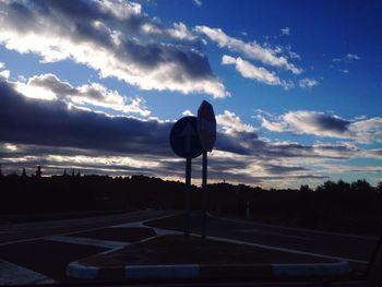 View of road against cloudy sky