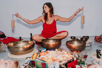 Woman holding a meditation class