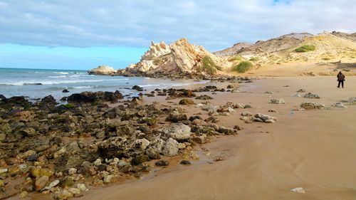 Scenic view of beach against sky