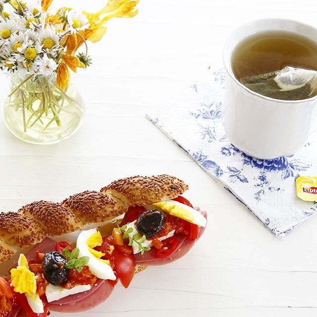 food and drink, freshness, food, drink, table, plate, ready-to-eat, indoors, refreshment, still life, healthy eating, serving size, breakfast, drinking glass, bread, slice, indulgence, fruit, juice, high angle view