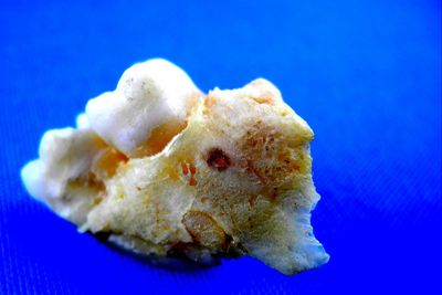 Close-up of bread against blue background