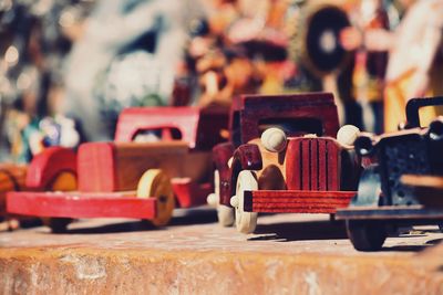 Close up of hand crafted wooden car models/ toys-rajasthan