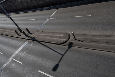 High angle view of shadow on road