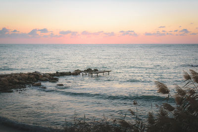 Scenic view of sea against sky during sunset