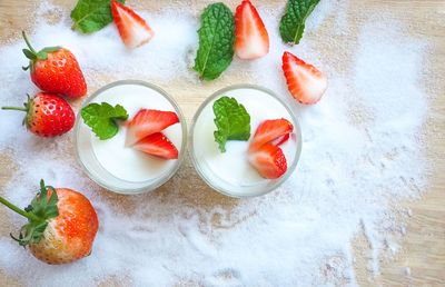 High angle view of strawberries on table