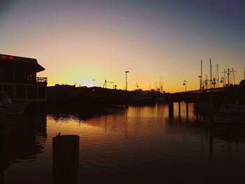 View of harbor at sunset