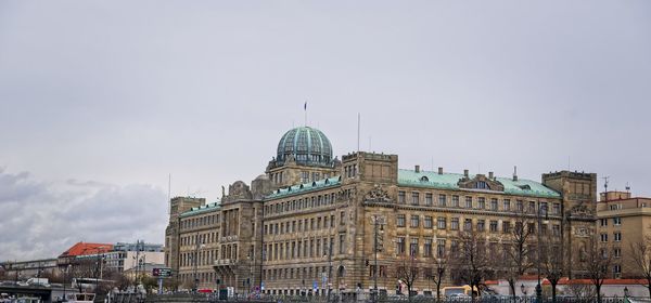 Buildings in city against sky