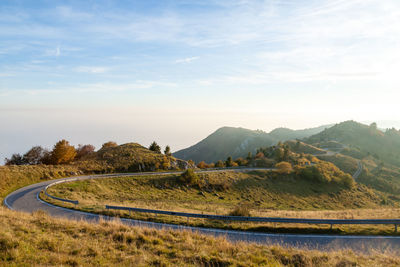 Scenic view of landscape and mountains against sky