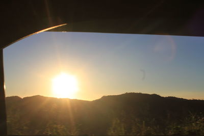 Scenic view of landscape against sky during sunset