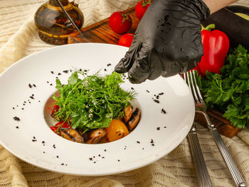 High angle view of salad in plate on table