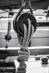 Close-up of rope tied at sailboat