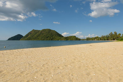 Scenic view of beach against sky