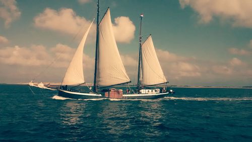 Boats sailing in sea