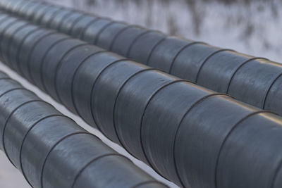 Close-up of pipes on roof of building