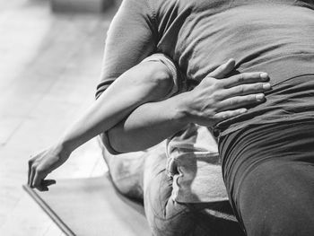 Close-up of couple doing yoga