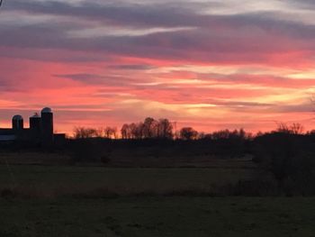 Scenic view of landscape against sky during sunset