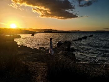 Scenic view of sea against sky during sunset